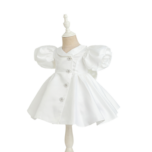 meejoy White dress with puff sleeves on a mannequin against a white background
